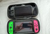 Nintendo Switch plus 4 igrice