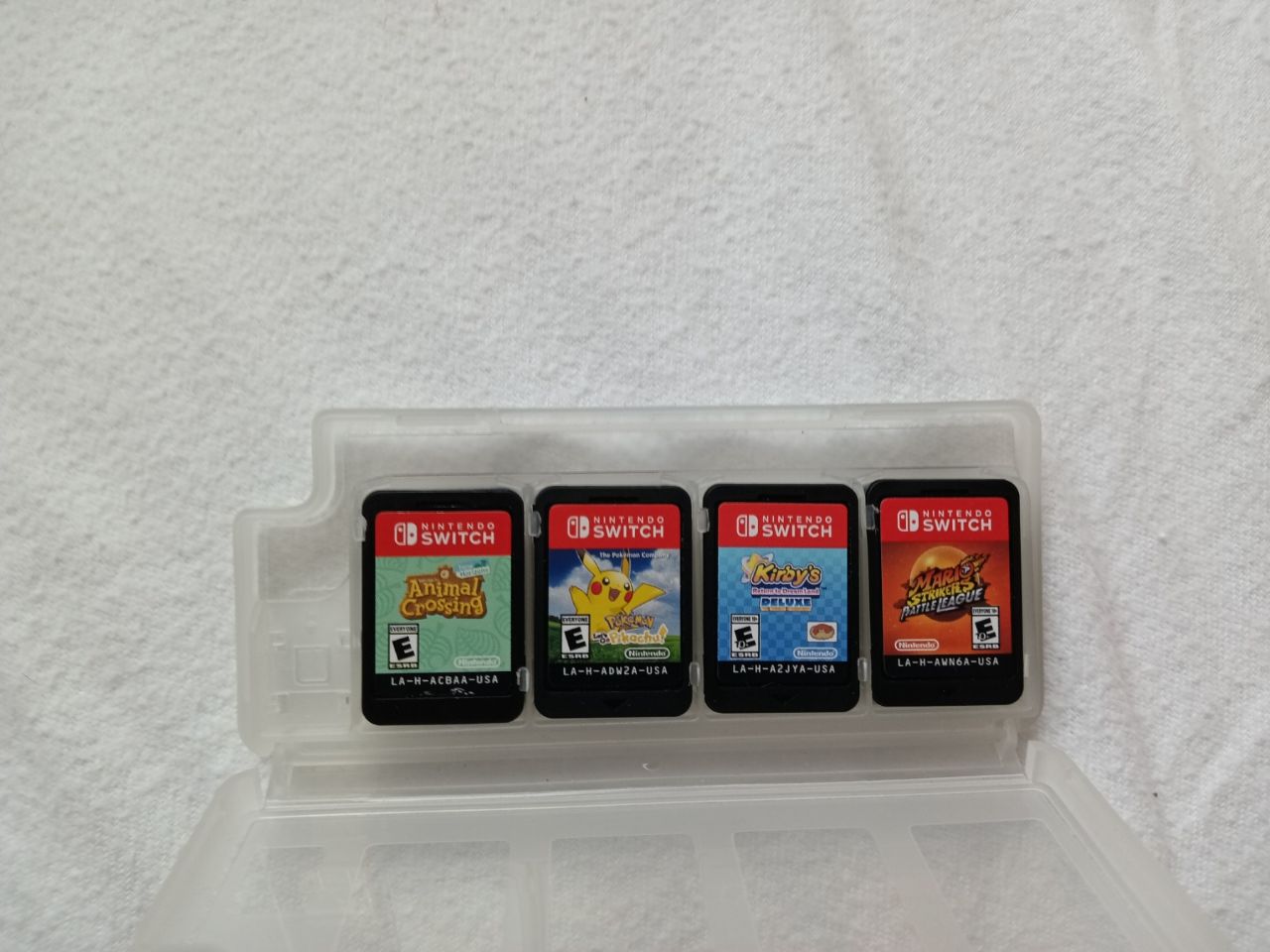 Nintendo Switch plus 4 igrice