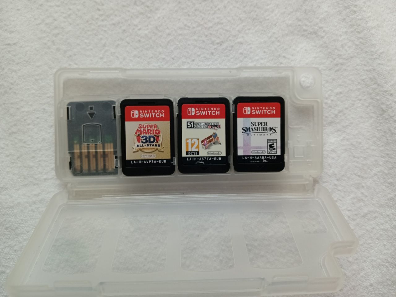 Nintendo Switch plus 4 igrice