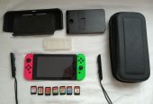Nintendo Switch plus 4 igrice